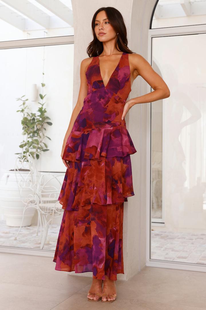 Maxi dress with V-neckline, layered ruffles, and floral print