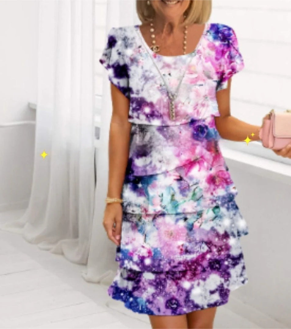 Layered dress with floral print and short sleeves