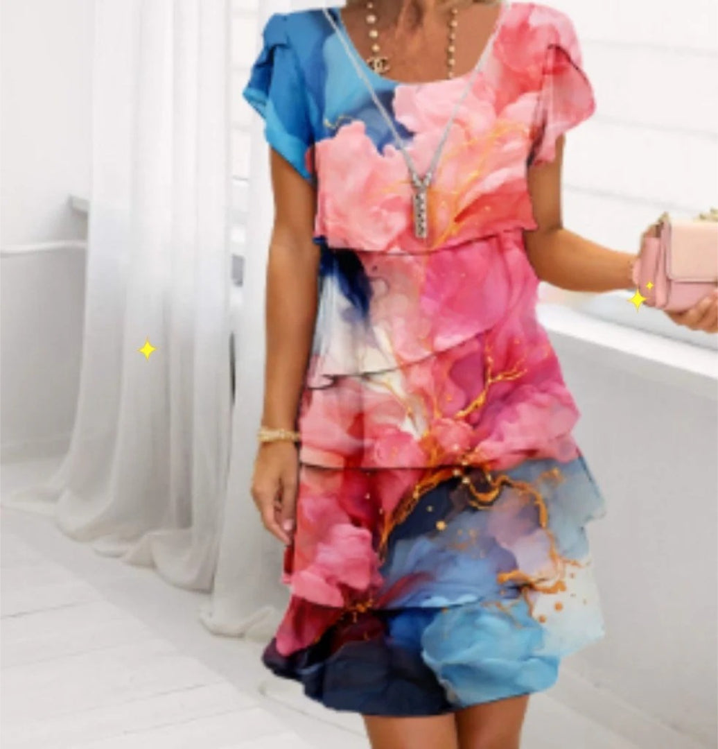 Layered dress with floral print and short sleeves
