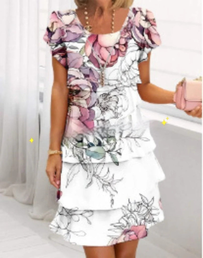 Layered dress with floral print and short sleeves