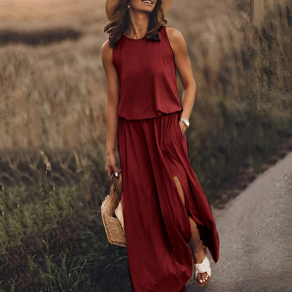Sleeveless maxi dress with side slit and round neckline