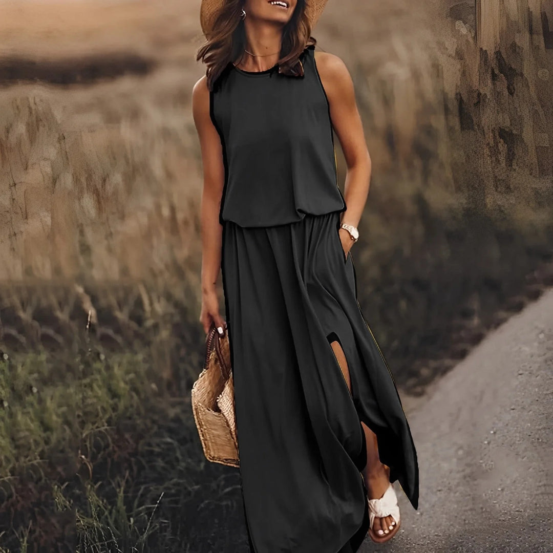 Sleeveless maxi dress with side slit and round neckline