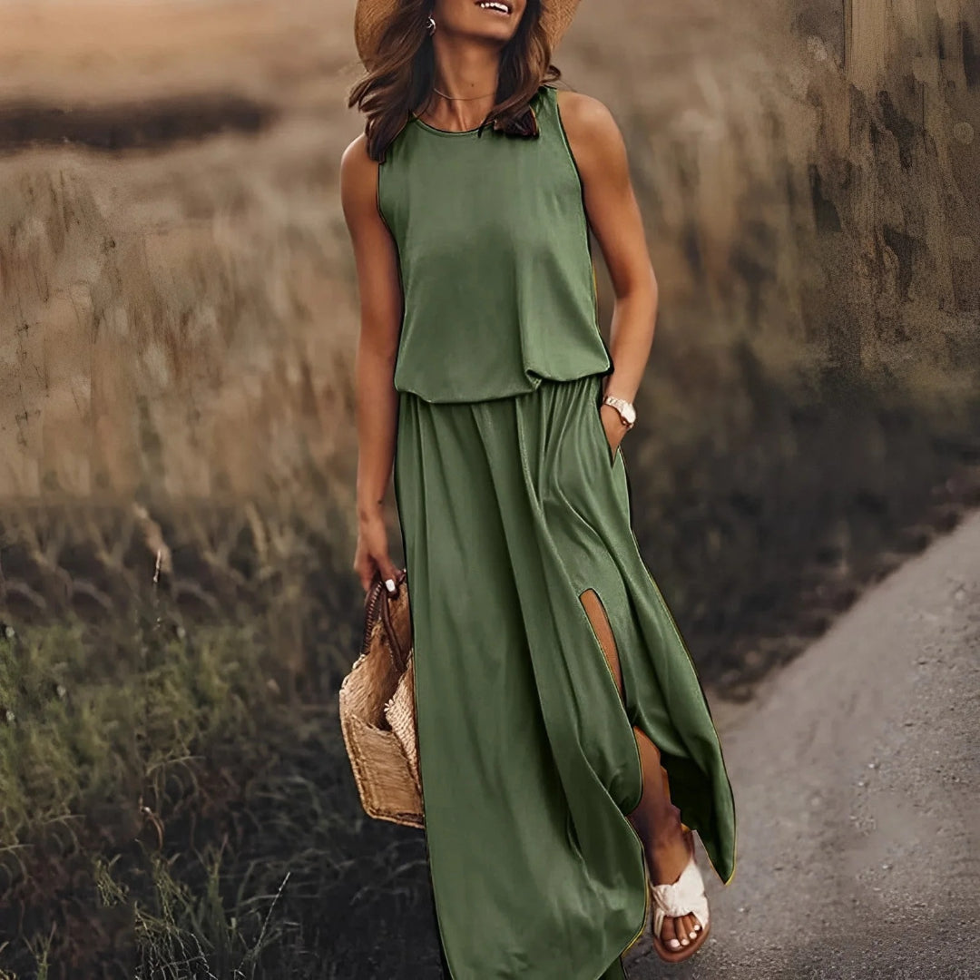 Sleeveless maxi dress with side slit and round neckline