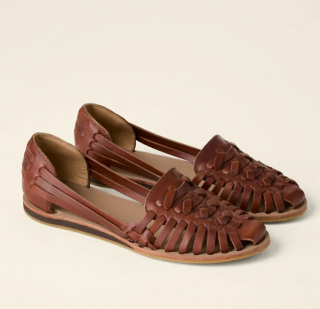 Woven leather sandals with a closed toe