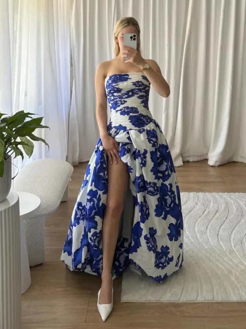 Strapless maxi dress with draping and floral high-low pattern