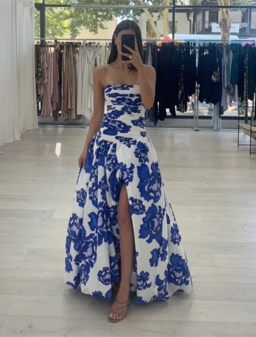 Strapless maxi dress with draping and floral high-low pattern