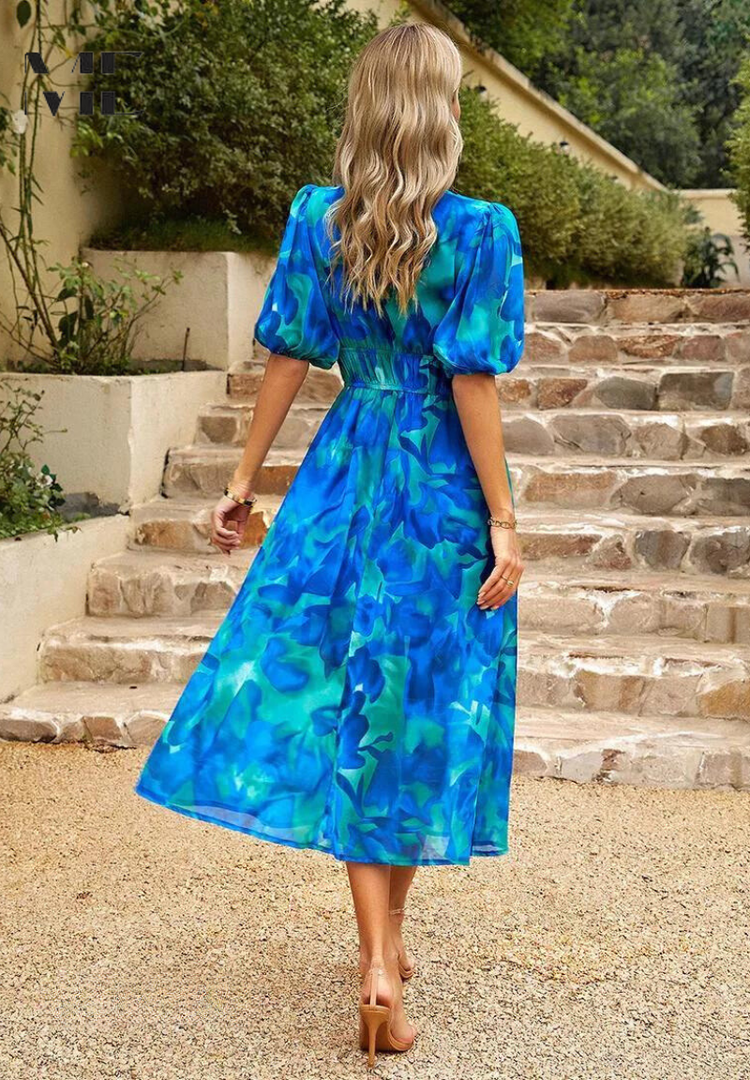 Floral midi dress with V-neckline and puff sleeves