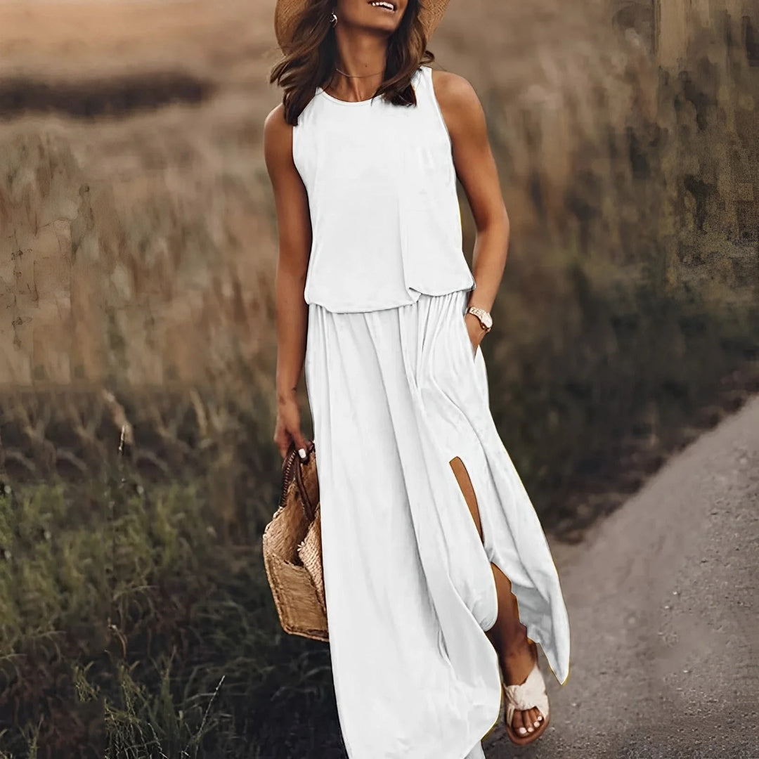 Sleeveless maxi dress with side slit and round neckline