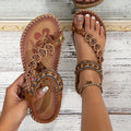 Open-toe sandals with beaded straps