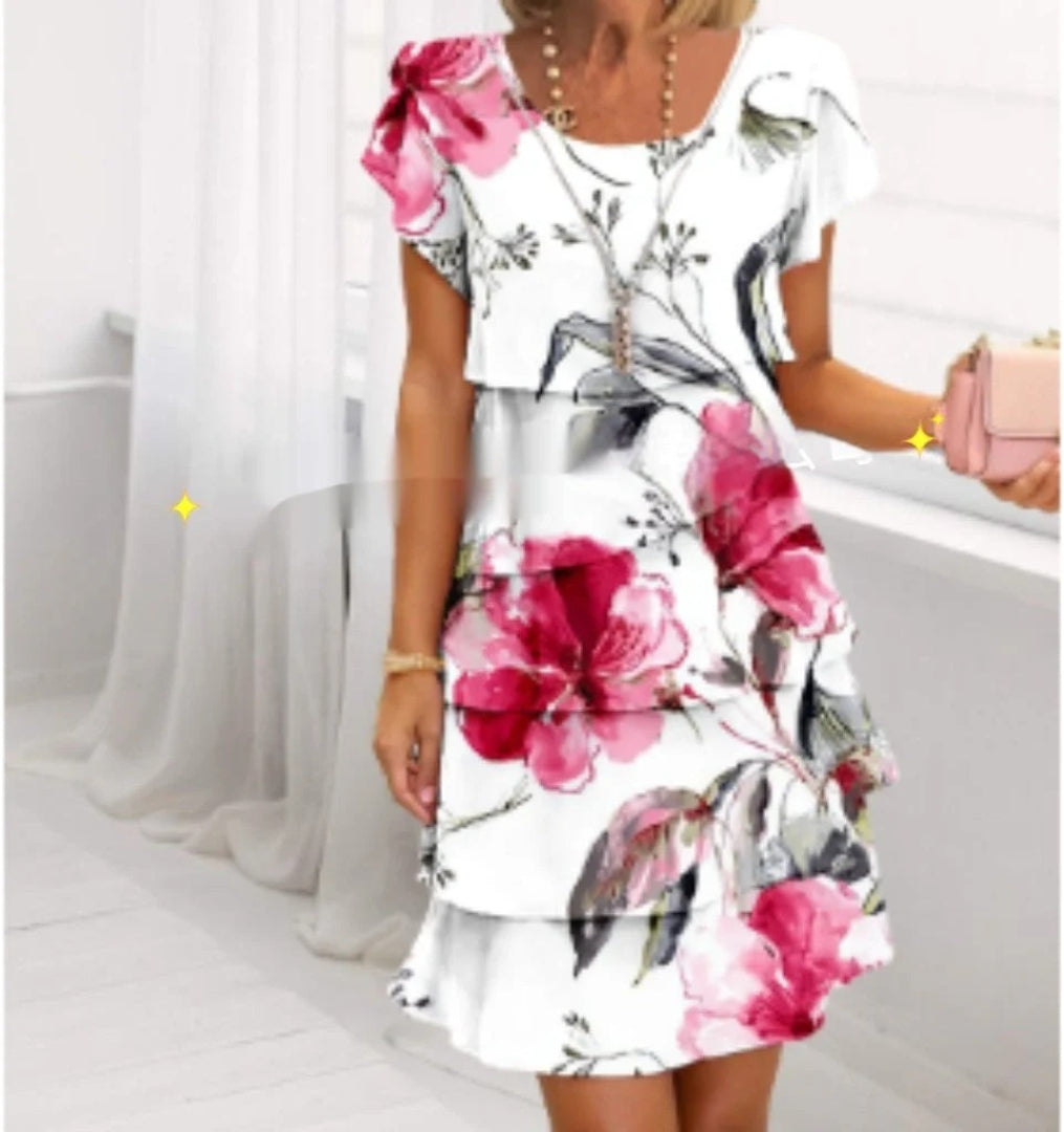 Layered dress with floral print and short sleeves