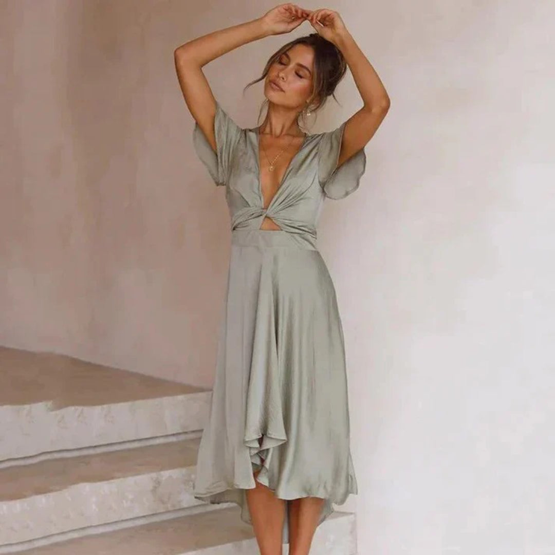 V-neck dress with ruffled sleeves and tie knot