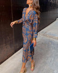 Long dress with V-neckline and long sleeves