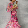 Long wrap dress with floral print and V-neckline