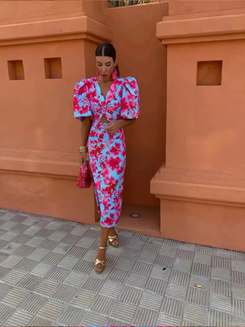 Midi dress with print, puff sleeves, and V-neckline