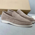 Suede slip-on loafers with stitching details